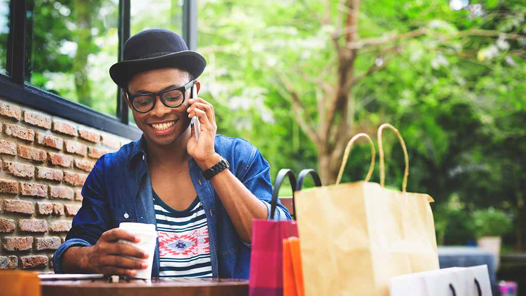 young man with shopping bags