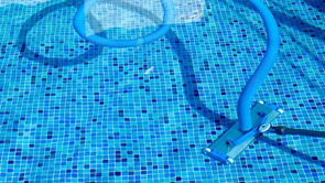 pool cleaning hose in pool