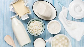 dairy products on wooden background