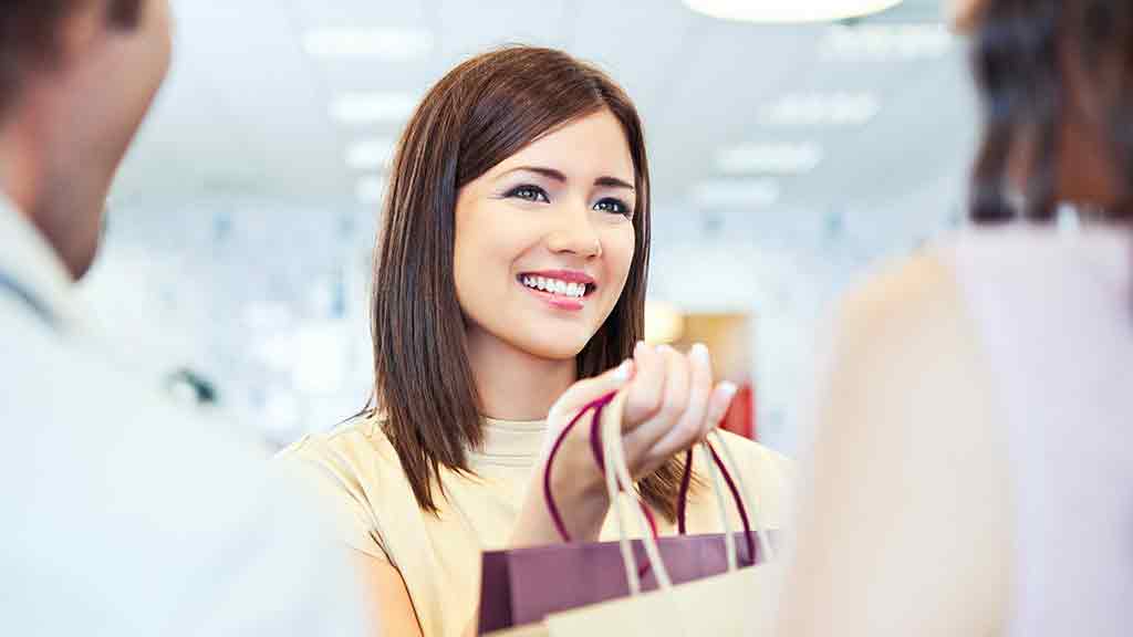 woman holding shopping bag