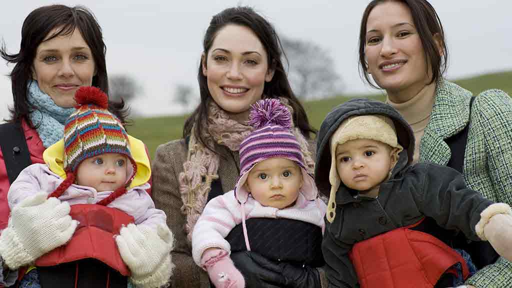 three mums with their babys in carriers